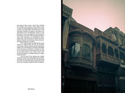 Closing text page beside carved wooden balconies on an old building under a pink hazy sky