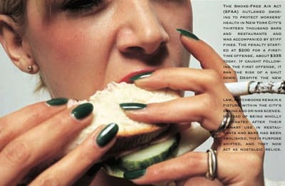 Booklet spread: close-up of a person with dark green nails biting a sandwich while holding a lit cigarette